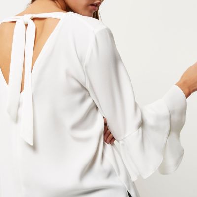 White double bell sleeve top